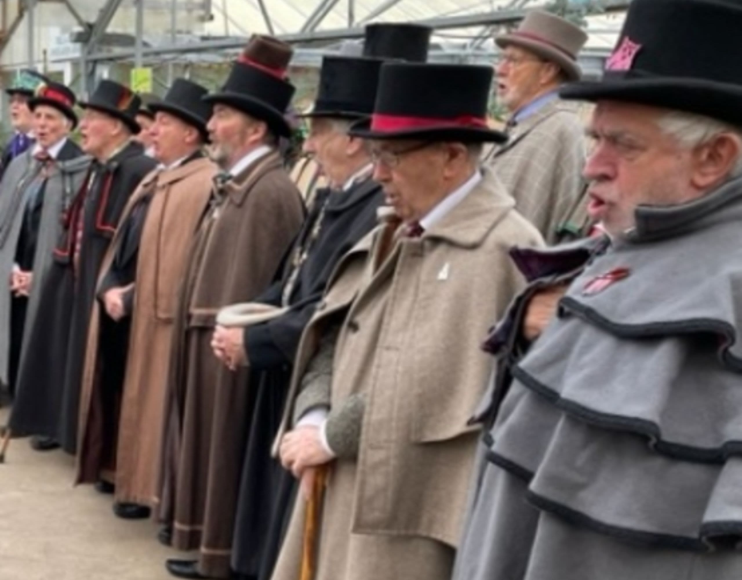 The Owls of Pill in recent years singing and wearing Dickensian outfits